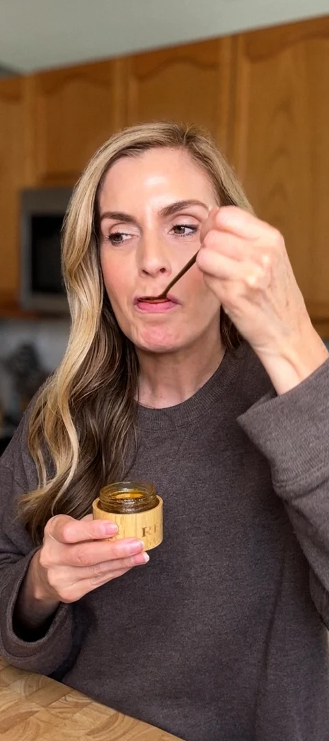 Customer tasting Real Mad Honey